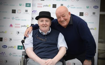 Tim Puts a smile on pal’s face at golf day